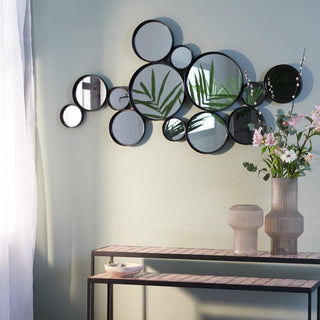 Circular black wall mirror