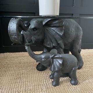 Mum & child black elephant side table with a round glass top