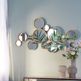 Gold circular wall mirror